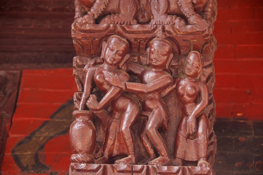 Erotic Wood Carvings, at ancient Pashupatinath Hindu Temple, Kathmandu, Nepal. Concept of tantric massage origin.