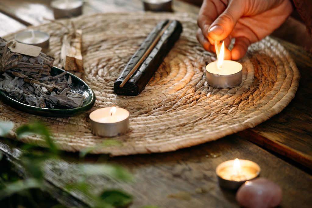 concept of ritual for tantric gay massage - lighting candles